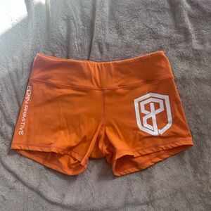 Born Primitive Women's Bright Orange Athletic Shorts
